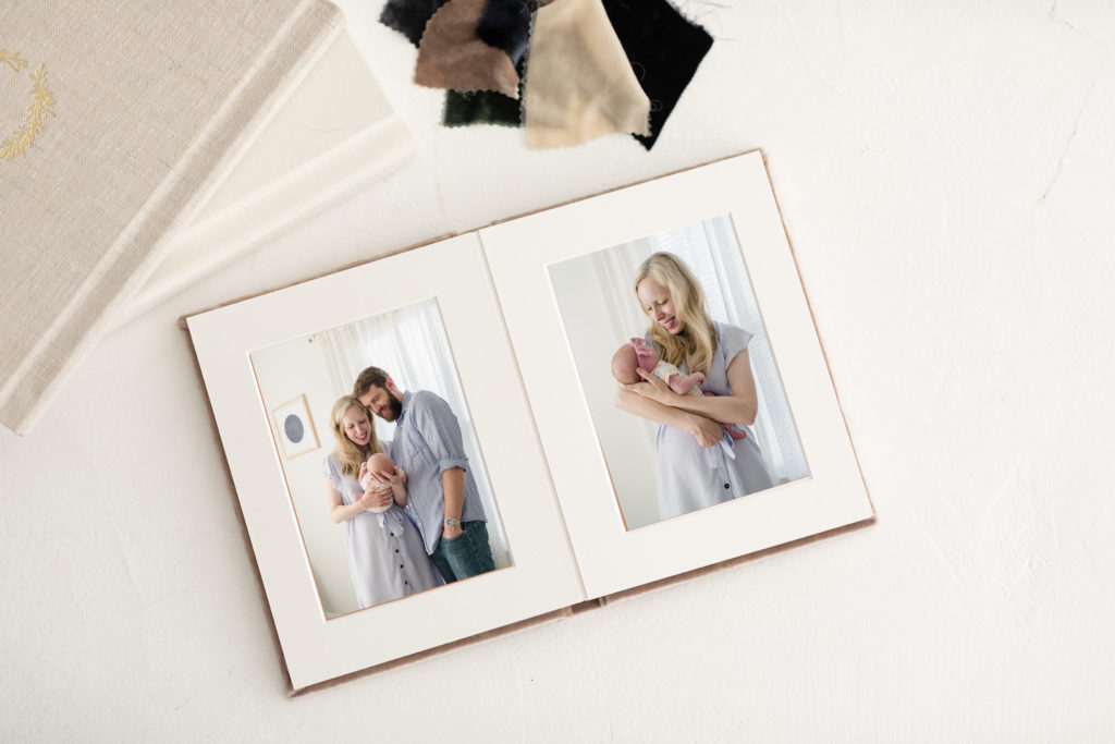 An heirloom album from a maternity and newborn photography plan.