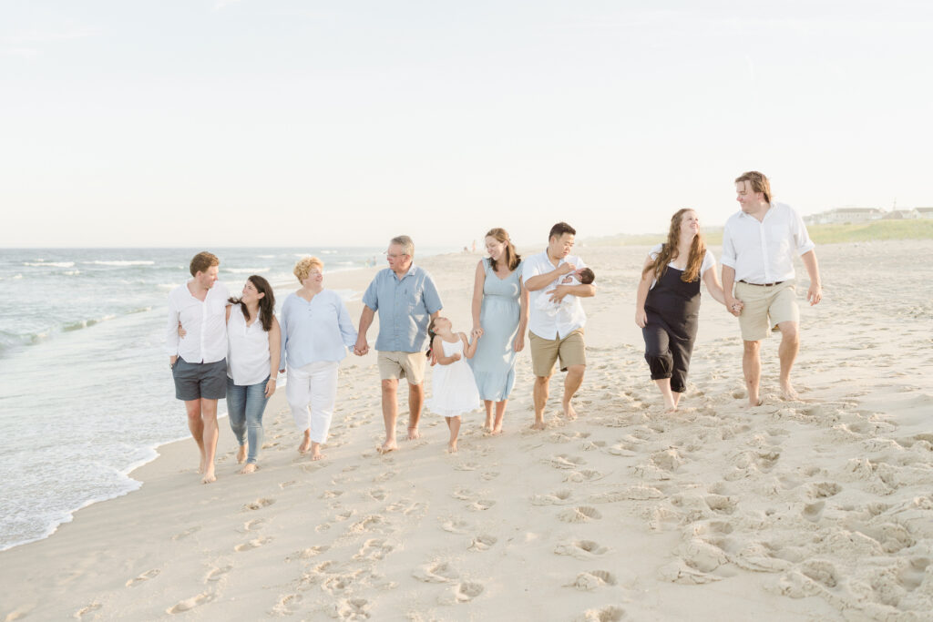 Extended family walking on the beach in Ocean City, NJ