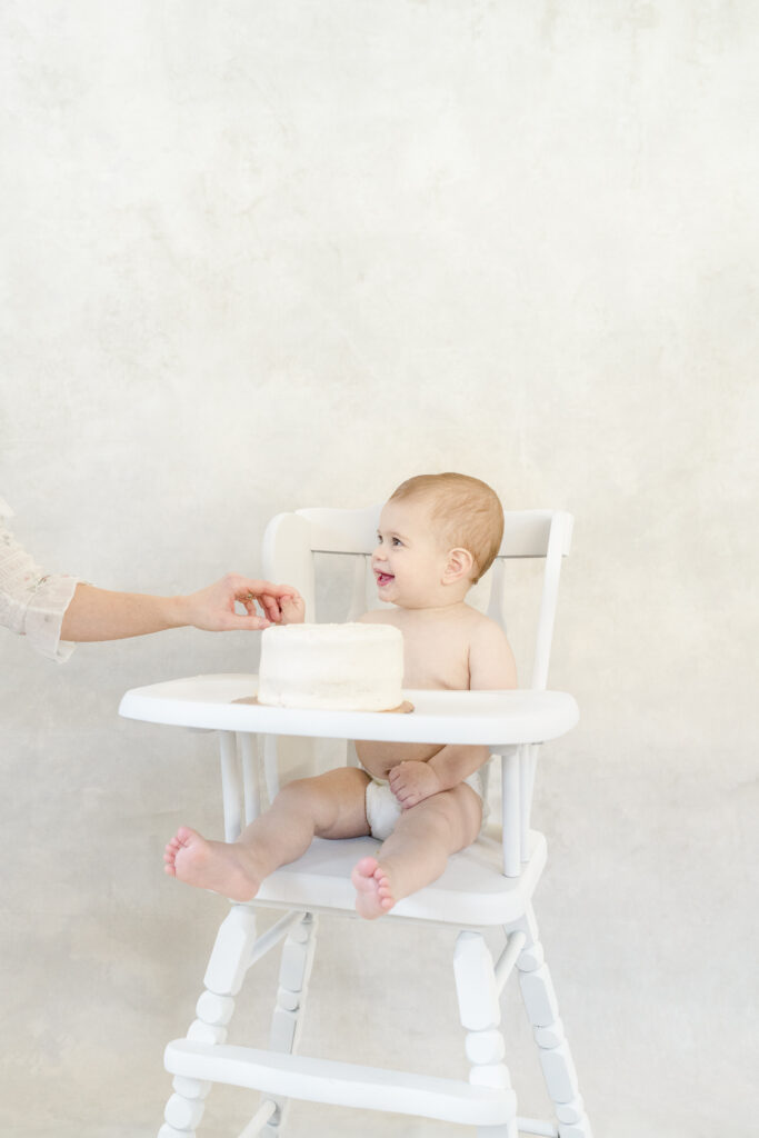 First birthday cake smash with vintage highchair.